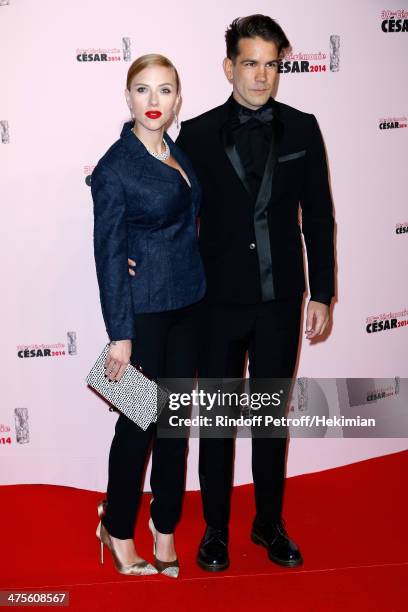 Actress Scarlett Johansson and Romain Dauriac arrive for the 39th Cesar Film Awards 2014 at Theatre du Chatelet on February 28, 2014 in Paris, France.