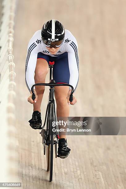 Jessica Varnish of Great Britain rides in the qualifying round of the Women's Sprint during day three of the 2014 UCI Track Cycling World...