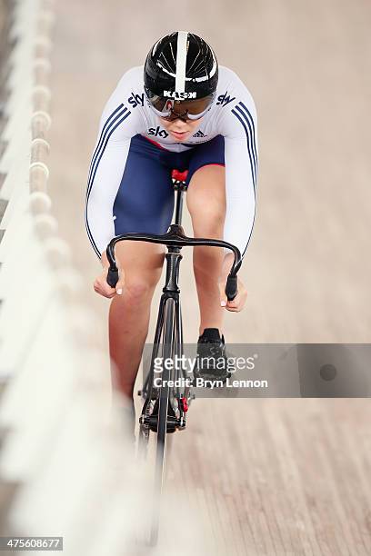 Jessica Varnish of Great Britain rides in the qualifying round of the Women's Sprint during day three of the 2014 UCI Track Cycling World...