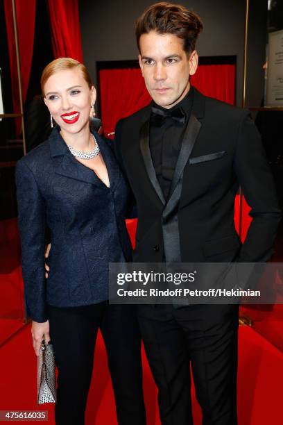 Actress Scarlett Johansson and Romain Dauriac arrive for the 39th Cesar Film Awards 2014 at Theatre du Chatelet on February 28, 2014 in Paris, France.