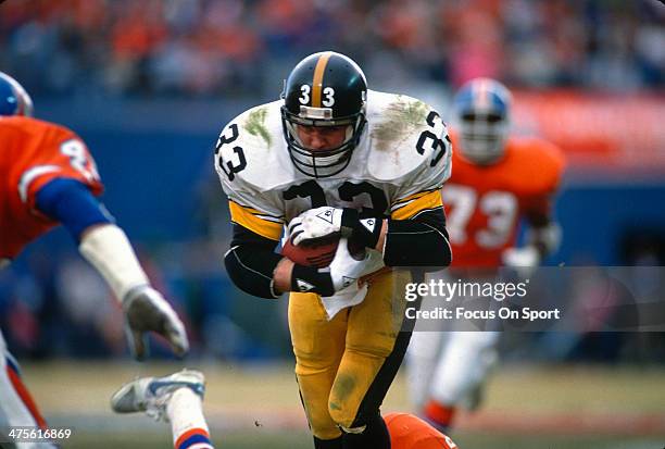 Merril Hoge of the Pittsburgh Steelers carries the ball against the Denver Broncos during the AFC Divisional Playoffs January 7, 1990 at Mile High...