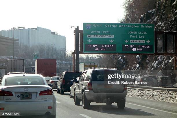 Typical morning commute backup at the George Washington Bridge. Cars and Trucks wait to crossover into New York City.