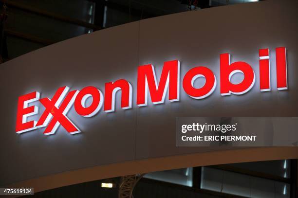 Picture shows the logo of US oil and gas giant ExxonMobil during the World Gas Conference exhibition in Paris on June 2, 2015. AFP PHOTO / ERIC...