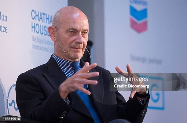 Pascal Lamy, former director general of the World Trade Organization , gestures as he speaks during the 'London Conference' at Lancaster House in...