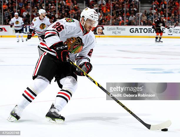 Kyle Cumiskey of the Chicago Blackhawks handles the puck against the Anaheim Ducks in Game Five of the Western Conference Finals during the 2015 NHL...