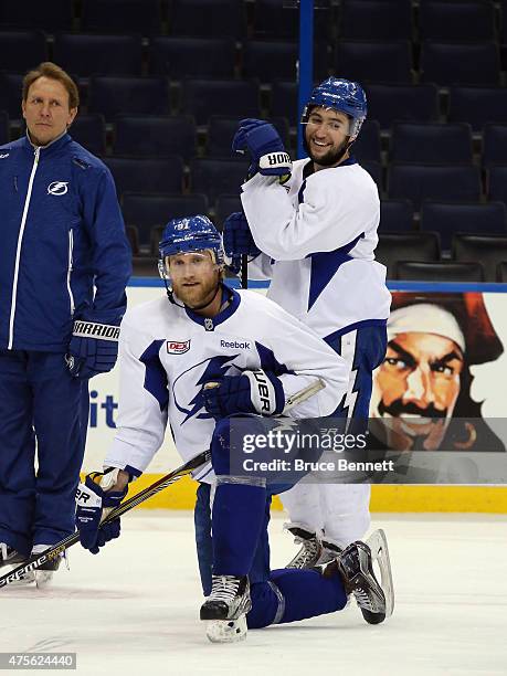 Steven Stamkos and Tyler Johnson of the Tampa Bay Lightning take part in a practice day prior to the 2015 NHL Stanley Cup Finals at Amalie Arena on...