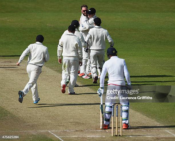 Mark Craig of New Zealand takes the wicket of Jos Butler of England to win the match during day five of the 2nd Investec Test Match between England...