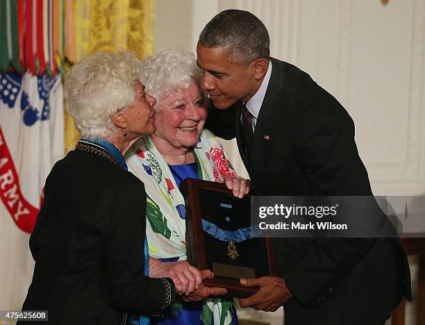 President Barack Obama presents the Medal of Honor to Elsie Shemin-Roth and Ina Bass , accepting on behalf of their late father, Army Sergeant...