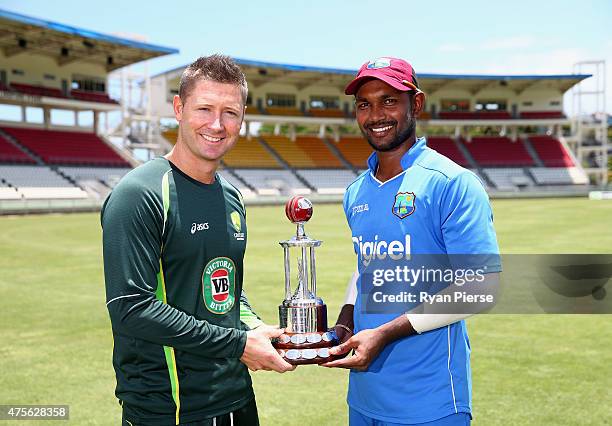 Michael Clarke of Australia and Denesh Ramdin of West Indies pose with the Frank Worrell Trophy before an Australian nets session at Windsor Park on...