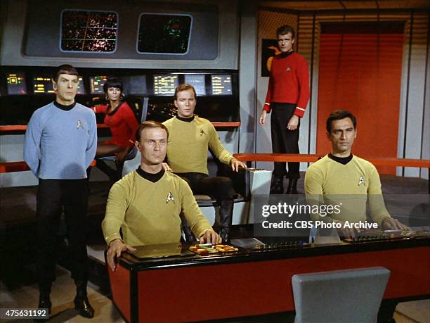 On the bridge of the USS Enterprise from left: Leonard Nimoy as Commander Spock , Nichelle Nichols as Lt. Uhura, William Blackburn as Lt. Hadley,...