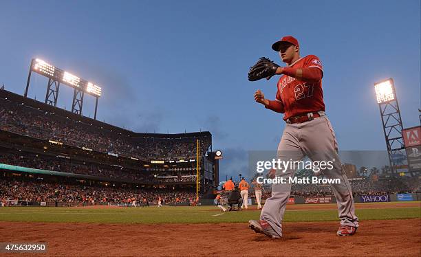 Mike Trout of the Los Angeles Angels of Anaheim heads to the dugout during the game against the San Francisco Giants at AT&T Park on May 1, 2015 in...