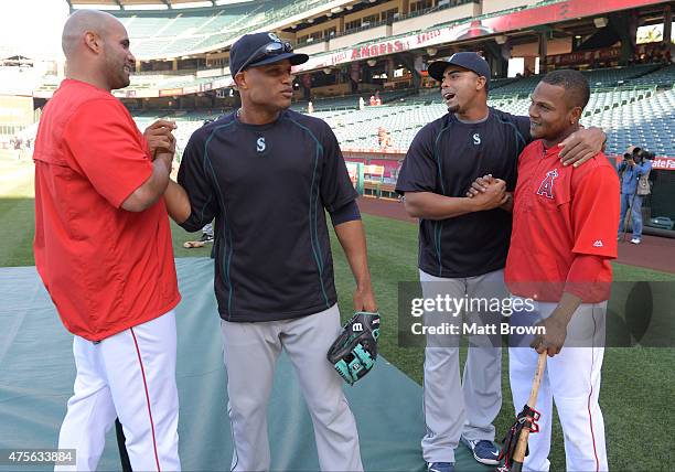 Albert Pujols of the Los Angeles Angels of Anaheim, Robinson Cano and Nelson Cruz of the Seattle Mariners and Erick Aybar of the Los Angeles Angels...