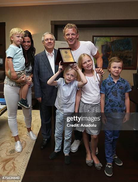 Fenerbahce's President Aziz Yildirim , Dirk Kuyt , Dirk Kuyt's wife Gertrude Kuyt and their kids pose during a ceremony held for Dirk Kuyt's leaving...