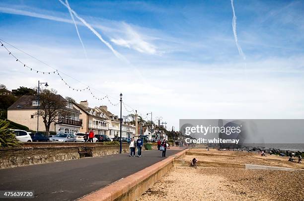 people on the promenade at felixstowe, suffolk - felixstowe stock pictures, royalty-free photos & images