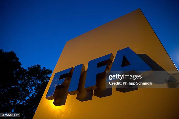 Logo sits on a sign at the FIFA headquarters on June 2, 2015 in Zurich, Switzerland. Joseph S. Blatter resigned as president of FIFA. The 79-year-old...