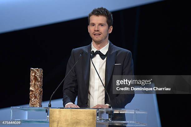 Actor Pierre Deladonchamps is awarded Most Promising Actor for 'Stranger by the Lake' on stage during the 39th Cesar Film Awards 2014 at Theatre du...