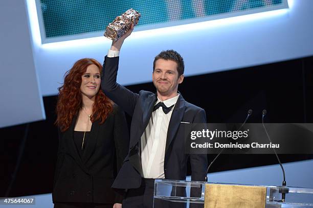 Audrey Fleurot presents actor Pierre Deladonchamps with the Most Promising Actor for 'Stranger by the Lake' award on stage during the 39th Cesar Film...