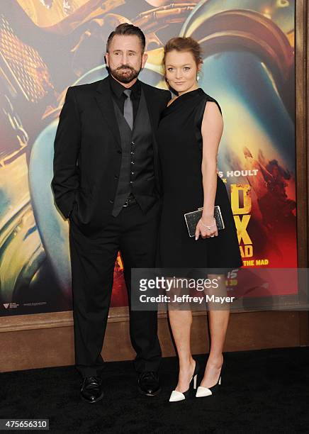 Actors Anthony LaPaglia and Alexandra Henkel arrive at the "Mad Max: Fury Road" Los Angeles Premiere at TCL Chinese Theatre IMAX on May 7, 2015 in...