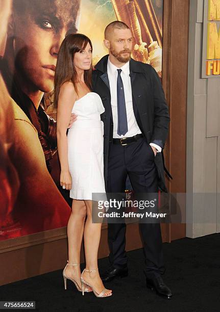 Actor Tom Hardy and Kelly Marcel arrive at the "Mad Max: Fury Road" Los Angeles Premiere at TCL Chinese Theatre IMAX on May 7, 2015 in Hollywood,...