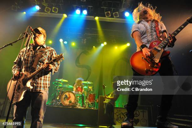 Chris Robertson, John Fred Young, Jon Lawhon and Ben Wells of Black Stone Cherry perform on stage at KOKO on February 28, 2014 in London, United...