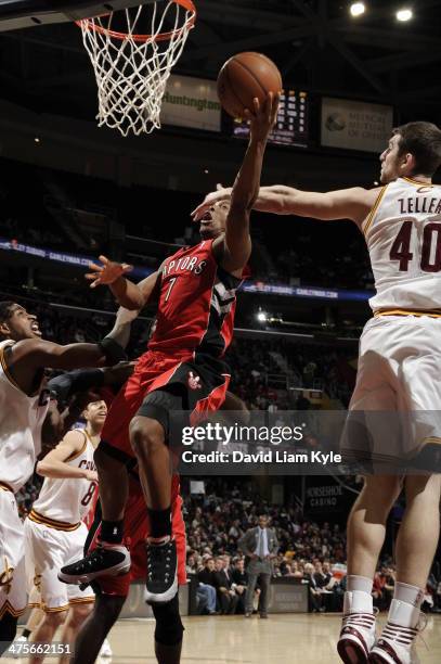 Kyle Lowry of the Toronto Raptors shoots against the Cleveland Cavaliers at The Quicken Loans Arena on February 25, 2014 in Cleveland, Ohio. NOTE TO...