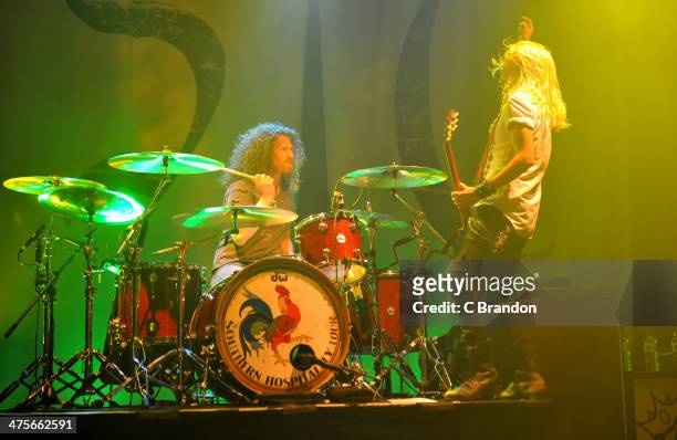 John Fred Young and Ben Wells of Black Stone Cherry perform on stage at KOKO on February 28, 2014 in London, United Kingdom.