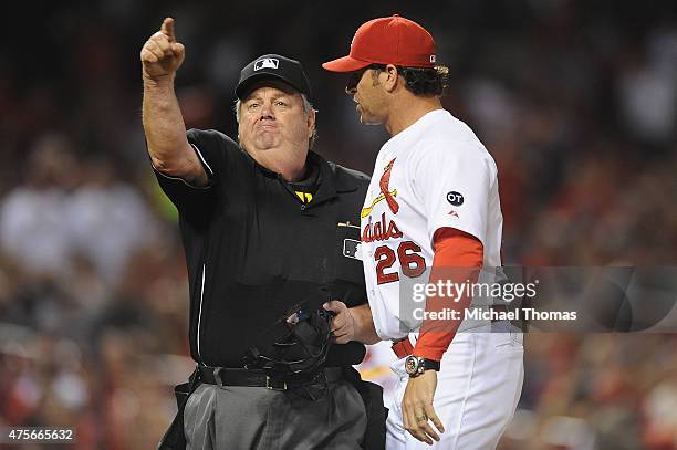 Cardinals Manager Mike Matheny is ejected in the in the seventh inning against the Milwaukee Brewers as he disputed a call at Busch Stadium on June...