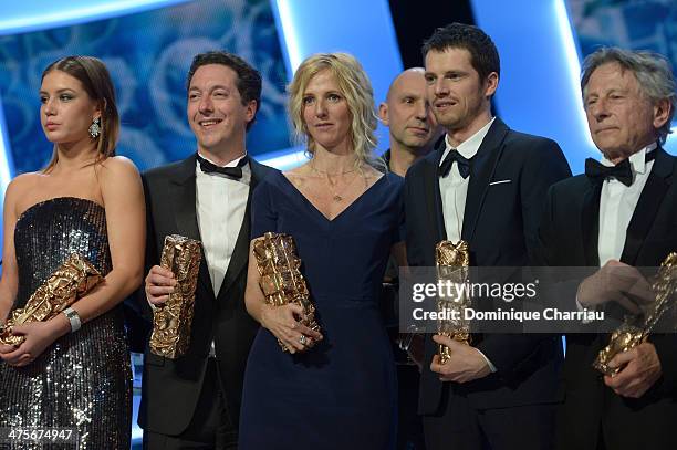 Adele Exarchopoulos, Guillaume Gallienne, Sandrine Kiberlain, Pierre Deladonchamps and Roman Polanski hold their awards on stage during the 39th...