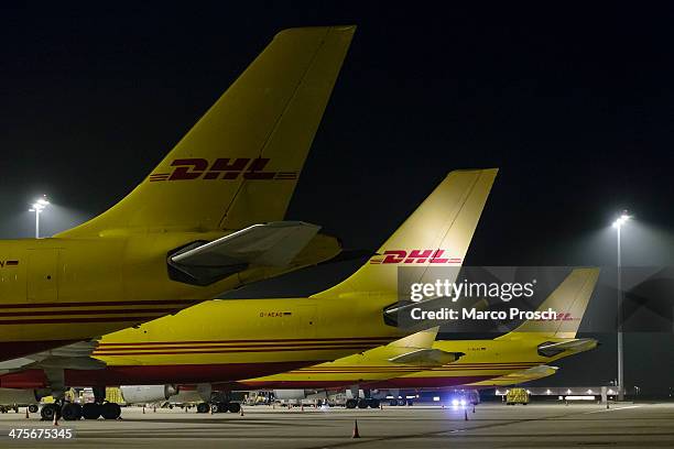 Cargo planes sit on the tarmac at Halle-Leipzig Airport on February 28, 2014 in Leipzig, Germany. The soon to-be-expanded hub handles 2,000 tons of...