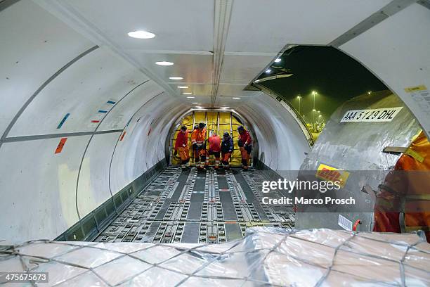 Cargo plane is unloaded at Halle-Leipzig Airport on February 28, 2014 in Leipzig, Germany. The soon to-be-expanded hub handles 2,000 tons of cargo,...