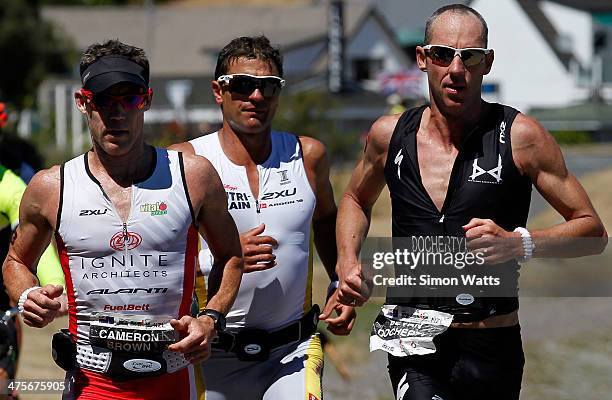 Cameron Brown, Terenzo Bozzone and Bevan Docherty of New Zealand during the New Zealand Ironman on March 1, 2014 in Taupo, New Zealand.