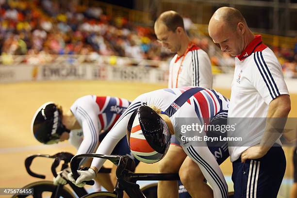 Rebecca James of Great Britain and team mate Jessica Varnish prepare to ride in the Women's Sprint during day three of the 2014 UCI Track Cycling...