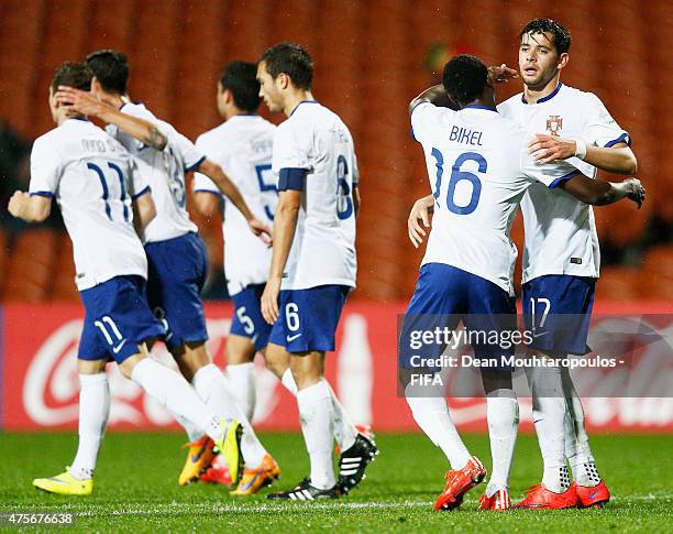 Ivo Rodrigues of Portugal celebrates with team mates after scores the third goal of the game during the FIFA U-20 World Cup New Zealand 2015 Group C...