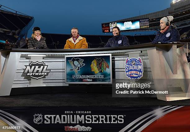 Network host Kathryn Tappen, Barry Melrose, Jamie McLennan, and Jamal Mayers on the set during the 2014 NHL Stadium Series practice day on February...