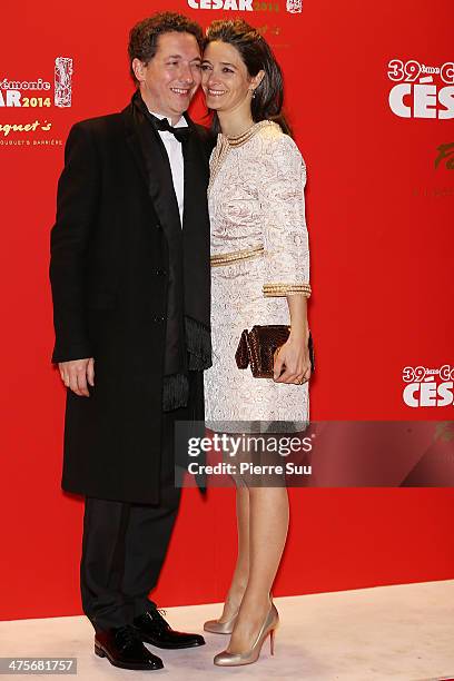 Guillaume Gallienne and his wife Amandine arrive for dinner after the 39th Cesar Film Awards 2014 at Le Fouquet's on February 28, 2014 in Paris,...