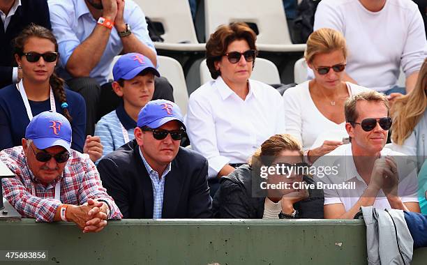 Father Robert Federer, Agent Tony Godsick, wife Mirka Federer and coach Stefan Edberg watch Roger Federer of Switzerland during his Men's quarter...