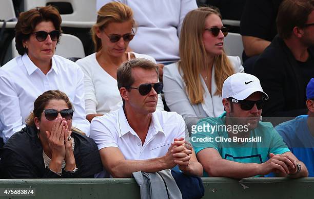 Wife Mirka Federer, coach Stefan Edberg and Severin Luthi watch Roger Federer of Switzerland during his Men's quarter final match against Stanislas...