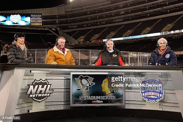 Network host Kathryn Tappen, Barry Melrose, Joel Quenneville and Jamal Mayers on the set during the 2014 NHL Stadium Series practice day on February...