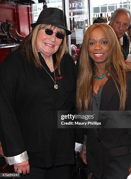 Penny Marshall and Charmaine Blake arrive at Charmaine Blake Ultra Gold Oscar Gifting Suite on February 28, 2014 in Los Angeles, California.