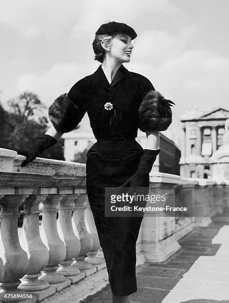 Future French singer and model Michèle Arnaud poses wearing a Chanel dress at the Place de la Concorde in Paris, France, on January 21, 1954.