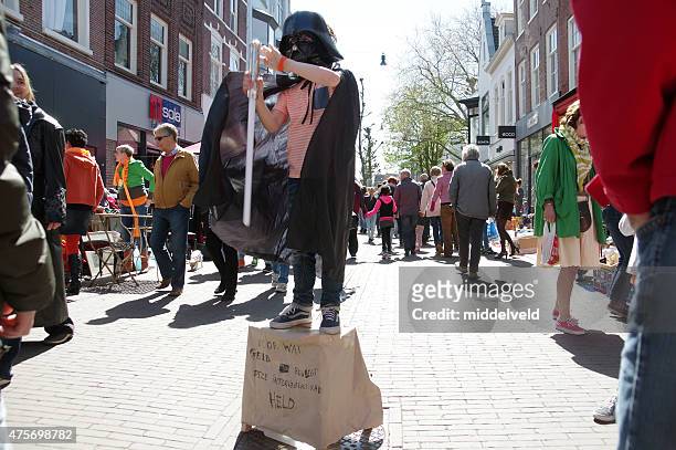 street actor in the city of haarlem - haarlem stock pictures, royalty-free photos & images