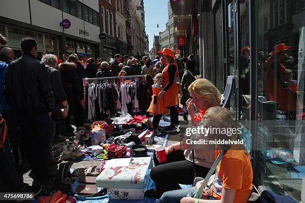 street market at koningsdag in haarlem - haarlem stock pictures, royalty-free photos & images