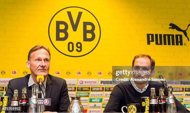 The new headcoach of Borussia Dortmund Thomas Tuchel and CEO Hans-Joachim Watzke attend a news conference at Signal Iduna Park on June 3, 2015 in...