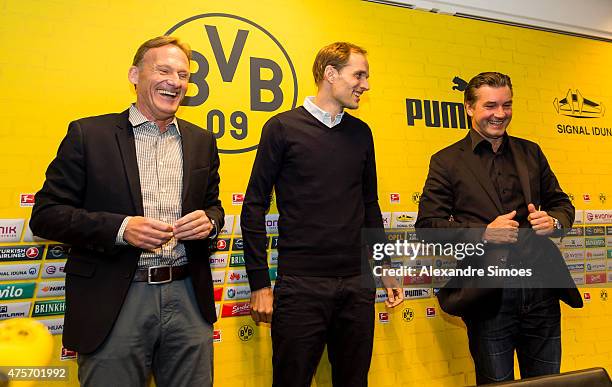 The new headcoach of Borussia Dortmund Thomas Tuchel , CEO Hans-Joachim Watzke and Sportmanager Michael Zorc attend a news conference at Signal Iduna...