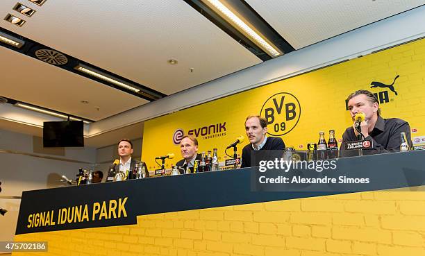 The new headcoach of Borussia Dortmund Thomas Tuchel, m., CEO Hans-Joachim Watzke, l., and Sportmanager Michael Zorc , r., with attends a news...