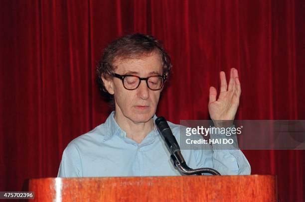 Actor and director Woody Allen reads a statement to the press, 18 August 1992 in New York, saying he was falsely accused of molesting his two...
