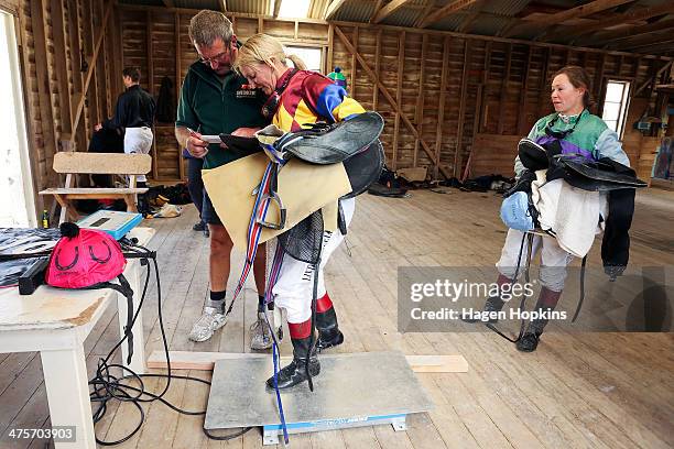 Jockeys weigh in after a race during the Castlepoint Beach Races on March 1, 2014 in Masterton, New Zealand.