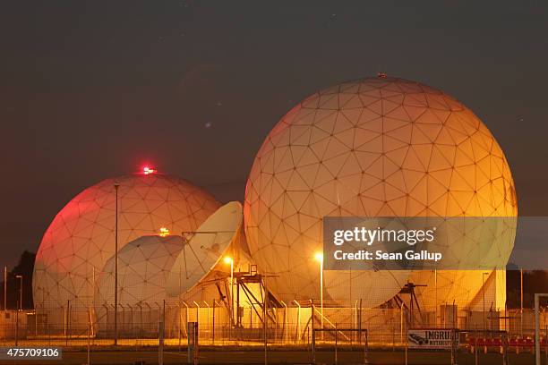 Radomes of the digital communications listening station of the Bundesnachrichtendienst , the German intelligence agency, stand at night on June 2,...