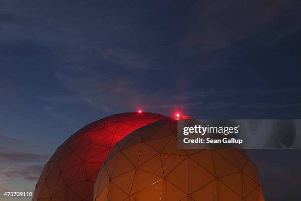 Radomes of the digital communications listening station of the Bundesnachrichtendienst , the German intelligence agency, stand at night on June 2,...
