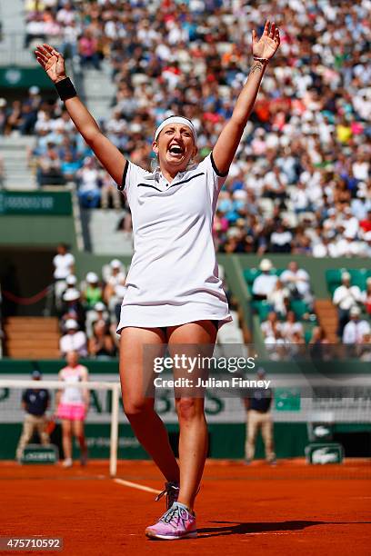 Timea Bacsinszky of Switzerland celebrates match point in her Women's quarter final match against Alison Van Uytvanck of Belgium on day eleven of the...